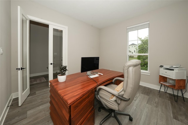 413 Stratus View Ct, Katy, TX 77493 - office featuring french doors, wood finished floors, and baseboards