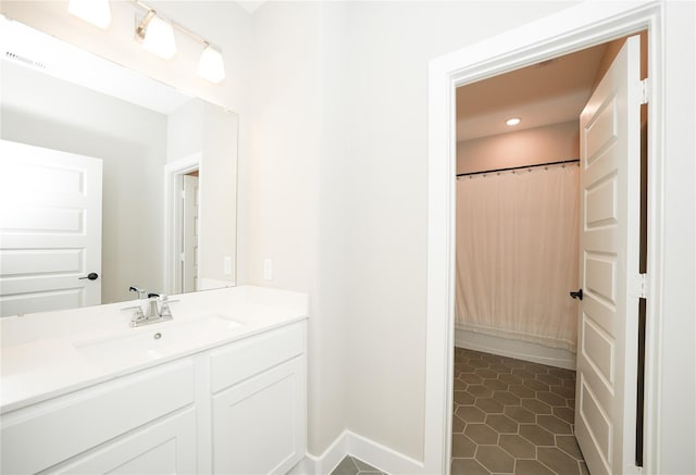 413 Stratus View Ct, Katy, TX 77493 - full bathroom featuring vanity, tile patterned floors, curtained shower, baseboards, and recessed lighting