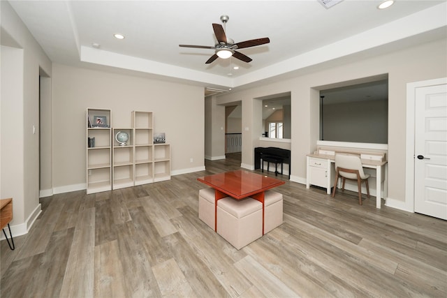 413 Stratus View Ct, Katy, TX 77493 - living area featuring wood finished floors, ceiling fan, recessed lighting, a desk, and baseboards