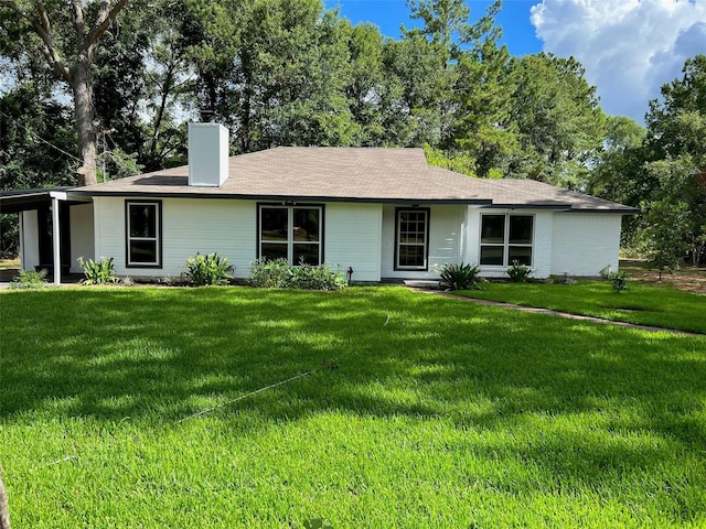 7477 Hidden Acres Dr, Cleveland, TX 77328 - ranch-style home with a chimney and a front yard