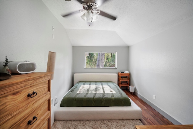 7477 Hidden Acres Dr, Cleveland, TX 77328 - bedroom featuring wood finished floors, a ceiling fan, and lofted ceiling