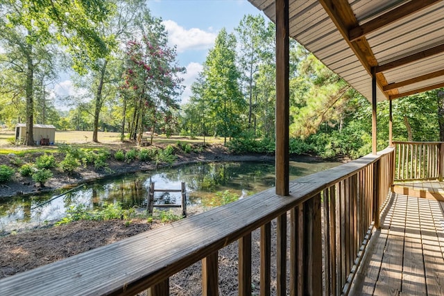 7477 Hidden Acres Dr, Cleveland, TX 77328 - wooden terrace with view of scattered trees