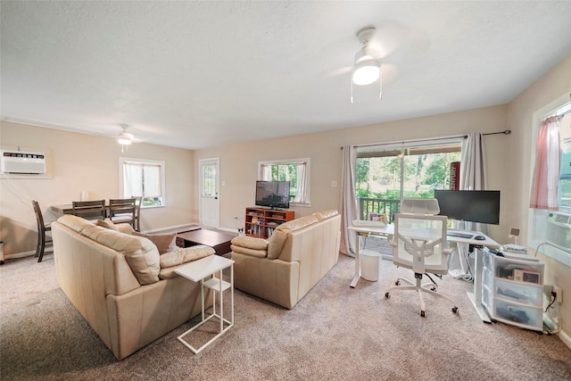 7477 Hidden Acres Dr, Cleveland, TX 77328 - living room with a ceiling fan, carpet, a wall mounted air conditioner, and cooling unit