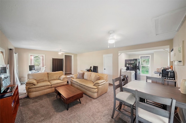 7477 Hidden Acres Dr, Cleveland, TX 77328 - living area with carpet flooring and washer / clothes dryer