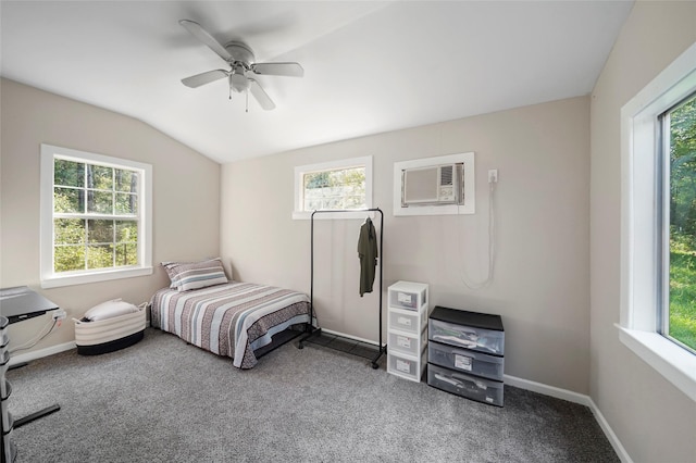 7477 Hidden Acres Dr, Cleveland, TX 77328 - carpeted bedroom featuring a wall mounted air conditioner, multiple windows, lofted ceiling, and ceiling fan