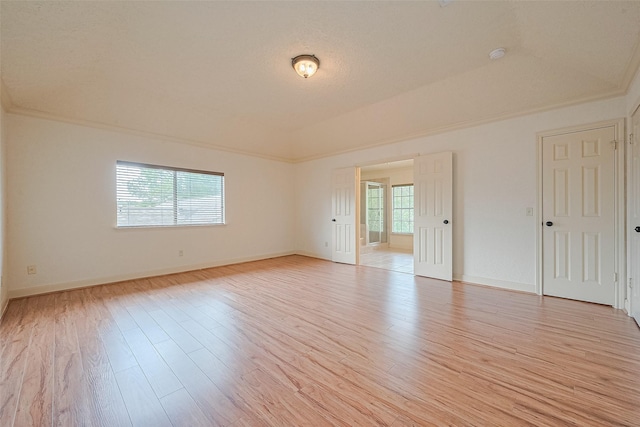 3614 Bee Bayou Ln, Sugar Land, TX 77479 - spare room with light wood finished floors, baseboards, and crown molding