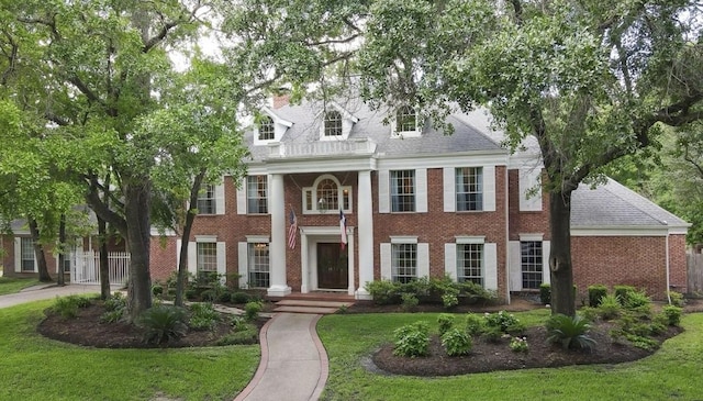 11774 Quail Creek Dr, Houston, TX 77070 - view of front facade with brick siding and a front yard