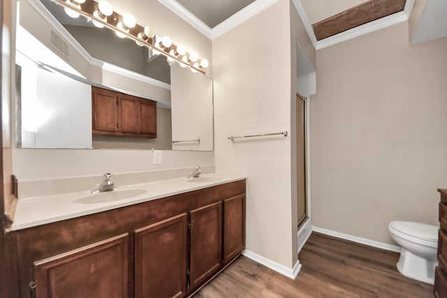 1115 Vang Ct, Crosby, TX 77532 - full bathroom with wood finished floors, crown molding, toilet, a stall shower, and double vanity
