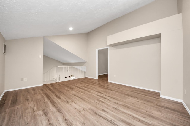 1115 Vang Ct, Crosby, TX 77532 - bonus room featuring wood finished floors, baseboards, recessed lighting, and vaulted ceiling