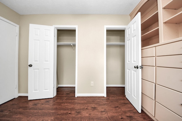 1115 Vang Ct, Crosby, TX 77532 - unfurnished bedroom featuring dark wood-style floors and baseboards