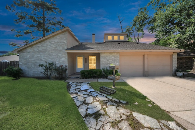 1115 Vang Ct, Crosby, TX 77532 - mid-century home featuring a garage, driveway, and brick siding