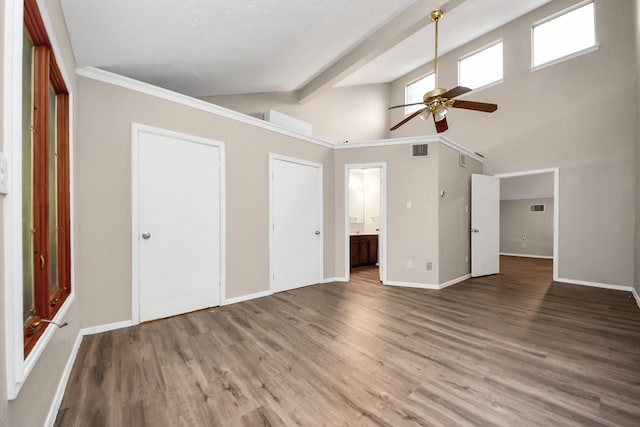 1115 Vang Ct, Crosby, TX 77532 - unfurnished bedroom featuring wood finished floors, baseboards, ensuite bathroom, and ceiling fan