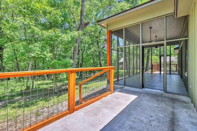 777 S Cape Royale Dr, Coldspring, TX 77331 - view of patio with a sunroom
