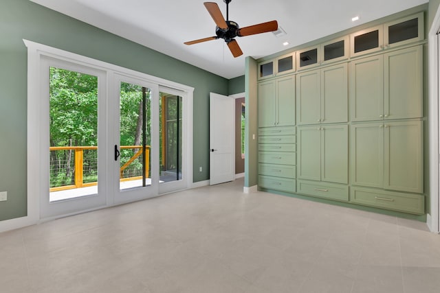 777 S Cape Royale Dr, Coldspring, TX 77331 - unfurnished bedroom featuring access to exterior, baseboards, ceiling fan, and recessed lighting