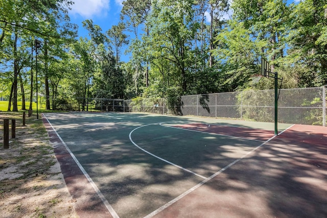 777 S Cape Royale Dr, Coldspring, TX 77331 - view of basketball court featuring fence and community basketball court