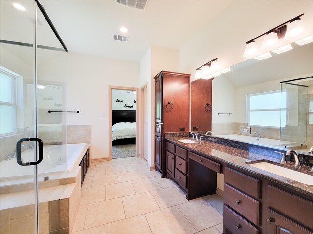 2755 Overlook Rd, Caldwell, TX 77836 - ensuite bathroom with double vanity, a garden tub, tile patterned flooring, and a shower stall