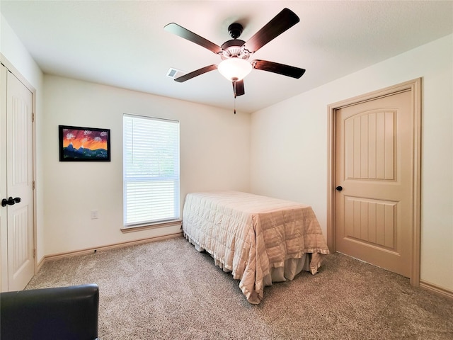 2755 Overlook Rd, Caldwell, TX 77836 - carpeted bedroom featuring baseboards and a ceiling fan