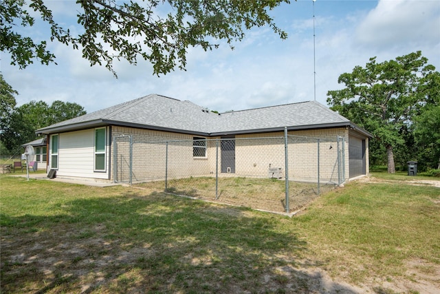 2755 Overlook Rd, Caldwell, TX 77836 - rear view of property featuring brick siding, a shingled roof, and a garage