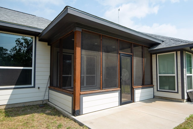 2755 Overlook Rd, Caldwell, TX 77836 - view of patio / terrace with a sunroom