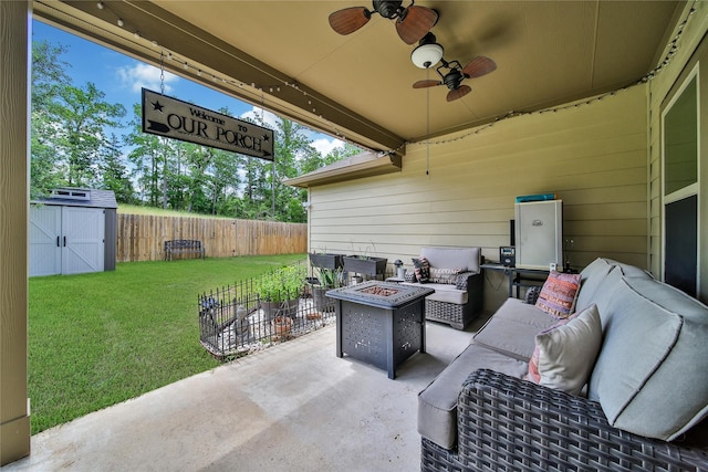 922 Golden Willow Ln, Conroe, TX 77304 - view of patio / terrace with an outdoor living space with a fire pit, a storage shed, an outbuilding, and a ceiling fan