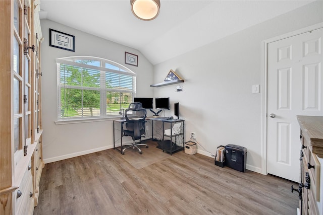 922 Golden Willow Ln, Conroe, TX 77304 - office with wood finished floors, vaulted ceiling, and baseboards