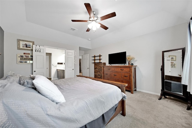 922 Golden Willow Ln, Conroe, TX 77304 - bedroom with light carpet, baseboards, a ceiling fan, and ensuite bath