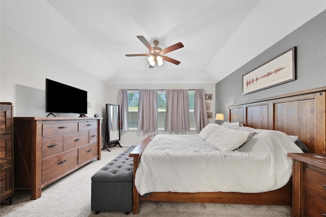 922 Golden Willow Ln, Conroe, TX 77304 - bedroom with light carpet, a raised ceiling, vaulted ceiling, and ceiling fan