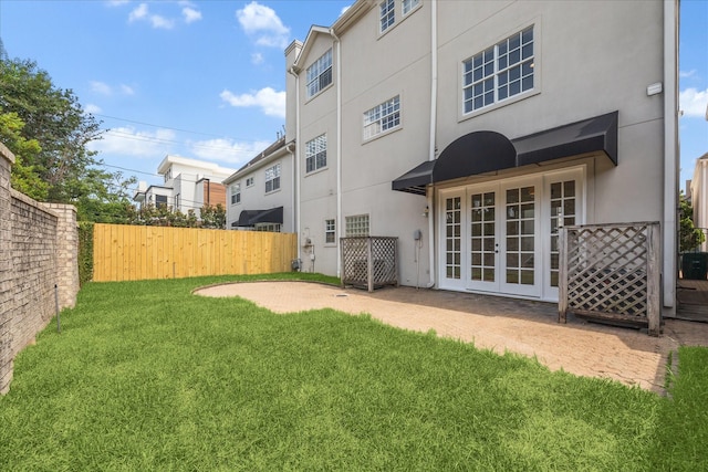 3007 Sackett St, Houston, TX 77098 - back of property featuring french doors and stucco siding