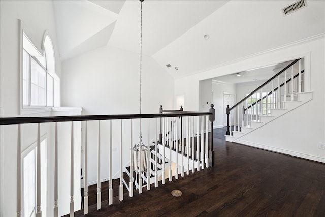 3007 Sackett St, Houston, TX 77098 - hallway featuring wood finished floors, vaulted ceiling, and baseboards