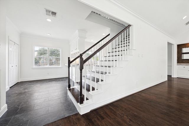 3007 Sackett St, Houston, TX 77098 - stairway with ornamental molding, baseboards, recessed lighting, and wood finished floors