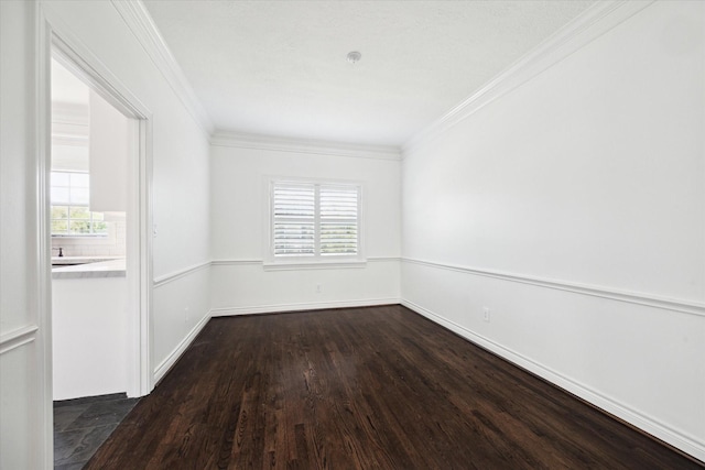 3007 Sackett St, Houston, TX 77098 - unfurnished room featuring dark wood-type flooring, ornamental molding, and baseboards