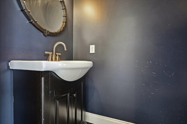 3007 Sackett St, Houston, TX 77098 - bathroom with vanity and baseboards