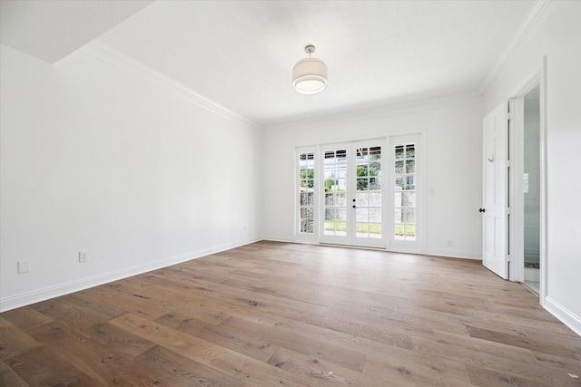 3007 Sackett St, Houston, TX 77098 - spare room with wood finished floors, ornamental molding, and baseboards