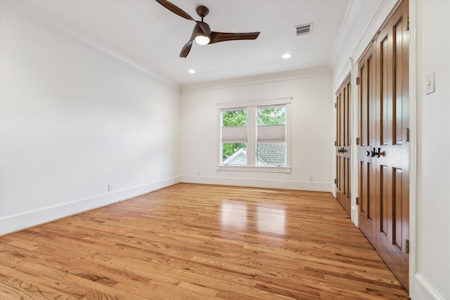 1010 Cortlandt St, Houston, TX 77008 - spare room with crown molding, a ceiling fan, light wood-type flooring, baseboards, and recessed lighting
