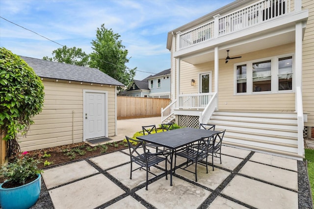 1010 Cortlandt St, Houston, TX 77008 - view of patio / terrace featuring outdoor dining space, a balcony, fence, and an outdoor structure