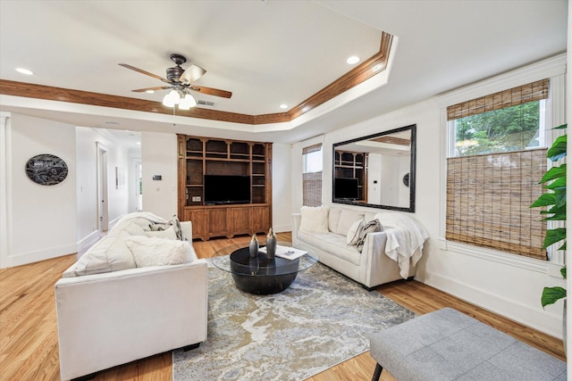 1010 Cortlandt St, Houston, TX 77008 - living area with a ceiling fan, baseboards, wood finished floors, recessed lighting, and a tray ceiling