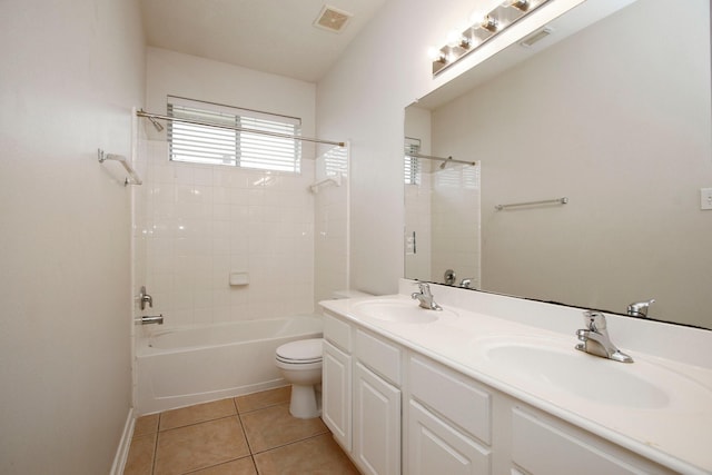2414 Hannover Valley Ct, Spring, TX 77388 - full bathroom with tile patterned floors, double vanity, toilet, washtub / shower combination, and baseboards
