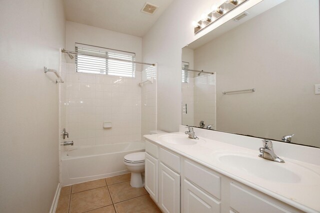 2414 Hannover Valley Ct, Spring, TX 77388 - full bath with double vanity, bathing tub / shower combination, tile patterned floors, toilet, and baseboards