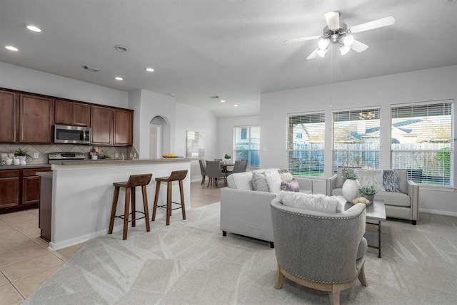 2414 Hannover Valley Ct, Spring, TX 77388 - living room featuring recessed lighting, light tile patterned flooring, baseboards, and ceiling fan