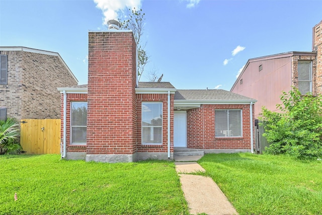 6334 Cambridge Glen Ln, Houston, TX 77035 - view of front of home featuring a chimney, brick siding, and a shingled roof