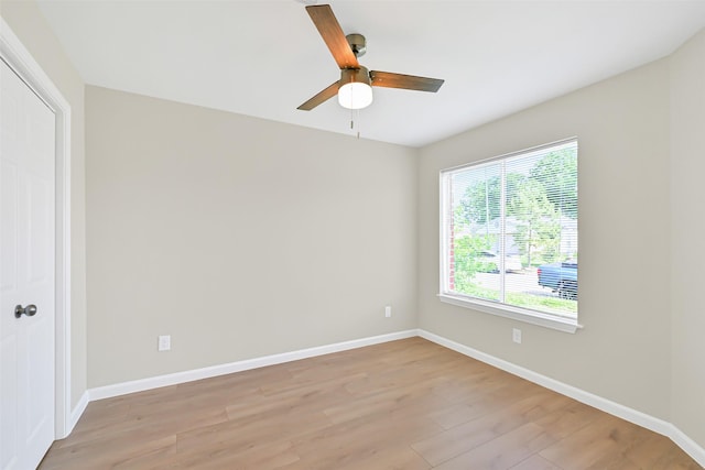 6334 Cambridge Glen Ln, Houston, TX 77035 - empty room with light wood-style floors, ceiling fan, and baseboards