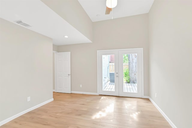 6334 Cambridge Glen Ln, Houston, TX 77035 - unfurnished room with light wood-style floors, baseboards, french doors, a high ceiling, and a ceiling fan