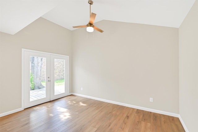 6334 Cambridge Glen Ln, Houston, TX 77035 - empty room featuring french doors, ceiling fan, light wood-style floors, baseboards, and high vaulted ceiling