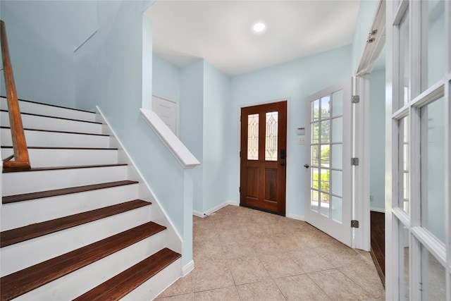 16655 Millridge Ln, Houston, TX 77095 - foyer featuring light tile patterned floors, stairway, recessed lighting, and baseboards