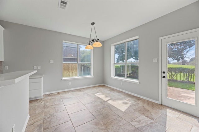 3427 Powell Way, Missouri City, TX 77459 - unfurnished dining area featuring baseboards