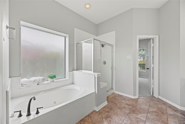 3427 Powell Way, Missouri City, TX 77459 - bathroom with a shower stall, a garden tub, and baseboards