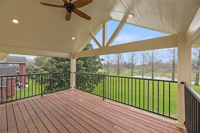 3427 Powell Way, Missouri City, TX 77459 - wooden deck with a water view, ceiling fan, and a lawn