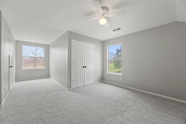 3427 Powell Way, Missouri City, TX 77459 - unfurnished bedroom featuring carpet flooring, multiple windows, and baseboards