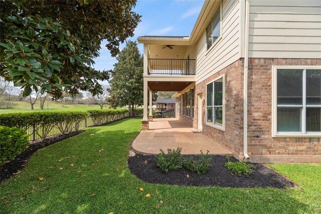 3427 Powell Way, Missouri City, TX 77459 - view of yard featuring a balcony, a patio, and a ceiling fan