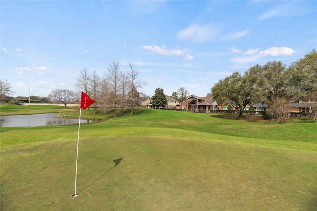 3427 Powell Way, Missouri City, TX 77459 - view of home's community with a water view, view of golf course, and a lawn